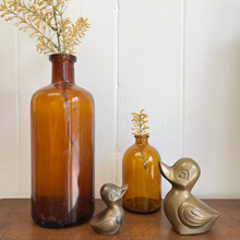 Load image into Gallery viewer, Pair of vintage brass ducks perfect for a baby nursery