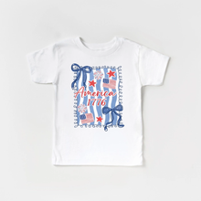 Load image into Gallery viewer, A white toddler t-shirt for girls with patriotic design featuring stars, stripes, and text on a white background