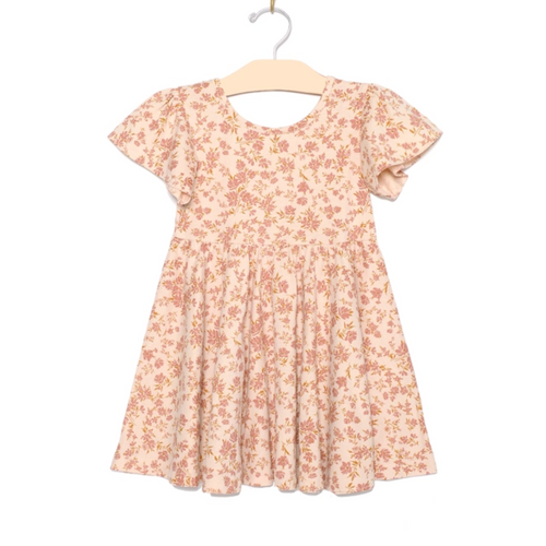 Toddler Girl Dress with floral pattern over a blush dress