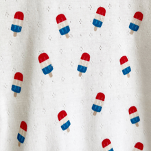 Load image into Gallery viewer, Close up of a repeated bomb pop popsicle pattern, on an infant bubble romper made of cotton pointelle. 