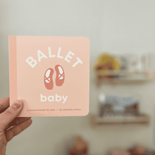 Load image into Gallery viewer, Book titled 'Ballet Baby' held by a hand with a blurred indoor background