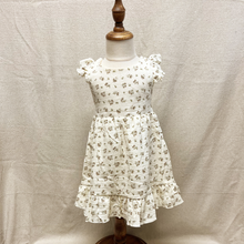 Load image into Gallery viewer, White floral dress on a child mannequin against a plain background