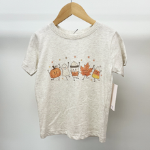 Load image into Gallery viewer, A light heather gray short-sleeve t-shirt for toddlers, hanging on a wooden hanger, featuring a cute autumn-themed graphic of a pumpkin, a ghost, a coffee cup, a smiling maple leaf, and a yellow character with stars.
