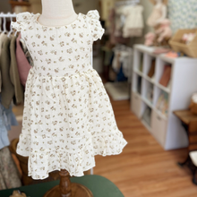 Load image into Gallery viewer, White floral dress on a toddler mannequin in a children's store, Gracie Lou.