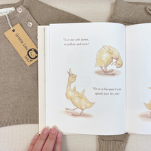 Load image into Gallery viewer, A baby knit sweater in a warm taupe-beige color, styled with an open children's book titled, I've Loved You From The Start, showing a duckling illustration and text. A branded tag reading 'Gracie Lou' is attached to the collar.
