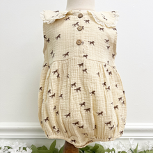 Load image into Gallery viewer, A western inspired baby girl bubble romper on a mannequin in front of a white wall.