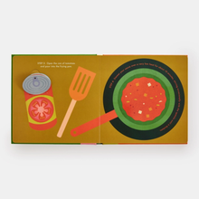 Load image into Gallery viewer, Illustrated book page with a tomato, spatula, and frying pan on a yellow background