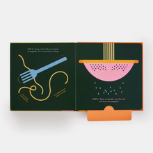 Load image into Gallery viewer, Open book with illustrations of kitchen tools on green pages with orange edges.