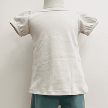 Load image into Gallery viewer, Shell colored A-line t-shirt on a mannequin with a plain background