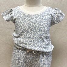 Load image into Gallery viewer, Floral patterned top and pants on a toddler mannequin against a neutral background