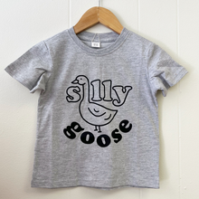 Load image into Gallery viewer, A Silly Goose tee shirt hanging against a white background
