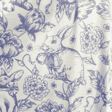 Load image into Gallery viewer, A close up picture of t he patterned fabric with blue rabbits and flowers on a white background