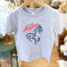 Load image into Gallery viewer, Gray toddler boys t-shirt with 'America' graphic design on a hanger
