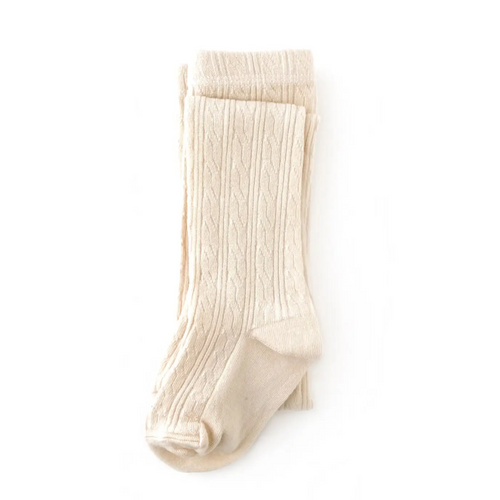 Cable knit tights in the color Vanilla available at Gracie Lou | A Boutique For Littles